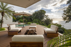 Ocean-view outdoor lounge and pool deck at Villa Belvedere Costa Rica