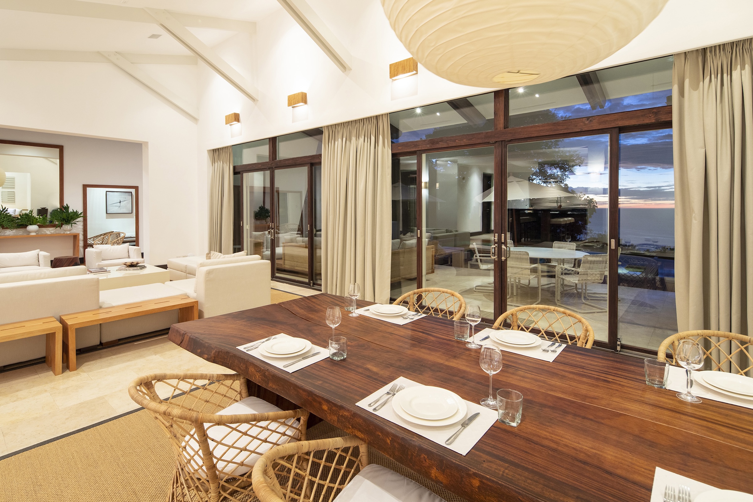 Luxury villa dining room set for a private chef dinner overlooking the Pacific Ocean in Peninsula Papagayo, Costa Rica
