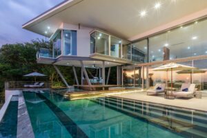 Contemporary Sky's Edge villa at Peninsula Papagayo illuminated at dusk