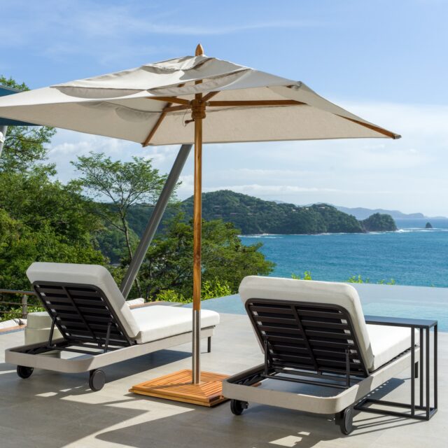 Poolside lounge chairs overlooking the Pacific Ocean at Sky’s Edge